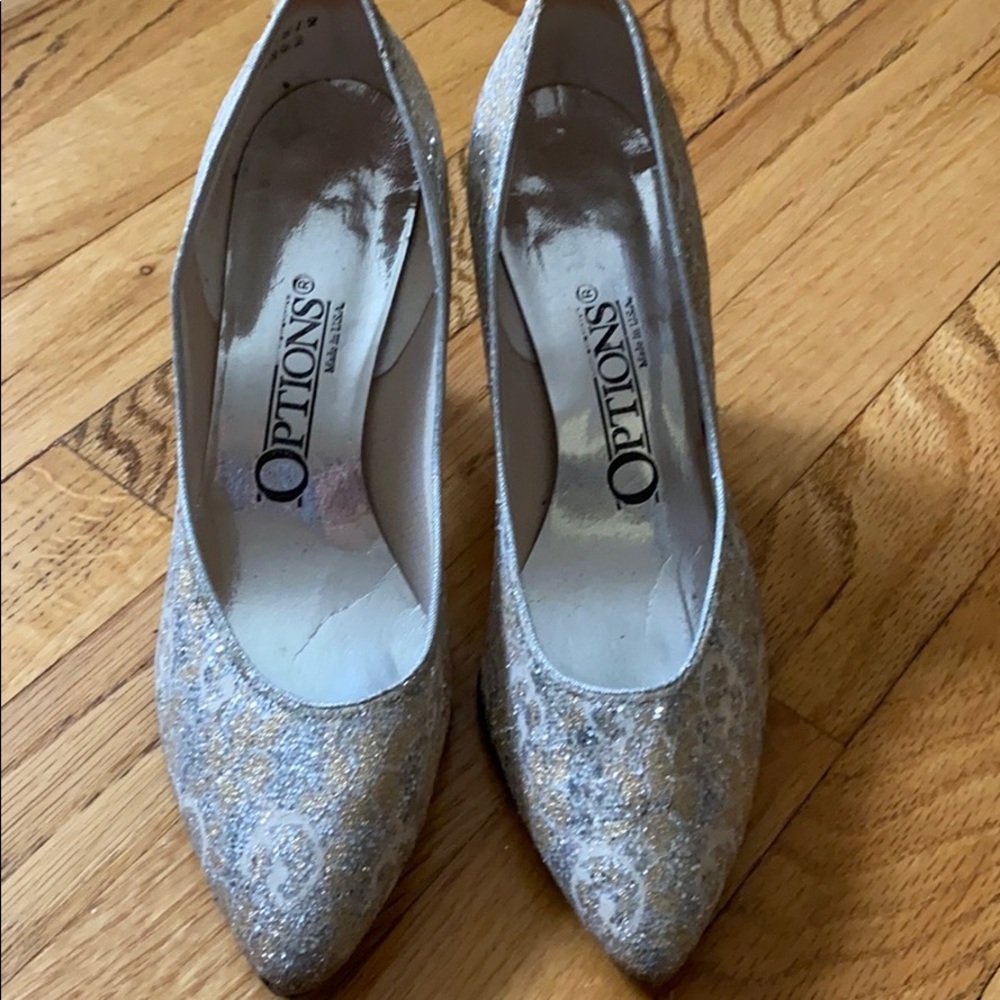 Options sz 7M EUC silver and gold heels.